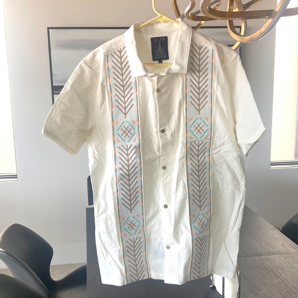 Brand new with tags. Never worn.